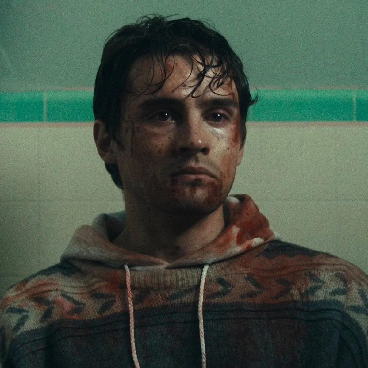 Bear, shaken and covered in blood, in the film's aftermath