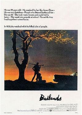 Theatrical poster for Badlands (1973), showing Kit and Holly silhouetted beneath a tree against a sunset