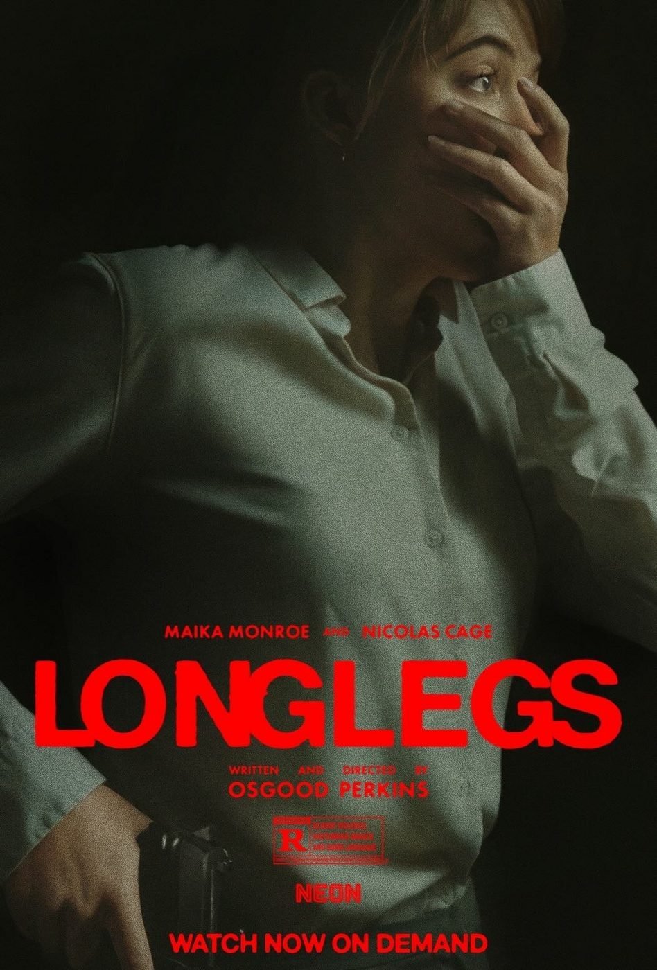 Official poster for Longlegs (2024), showing Maika Monroe with her hand over her mouth in fear