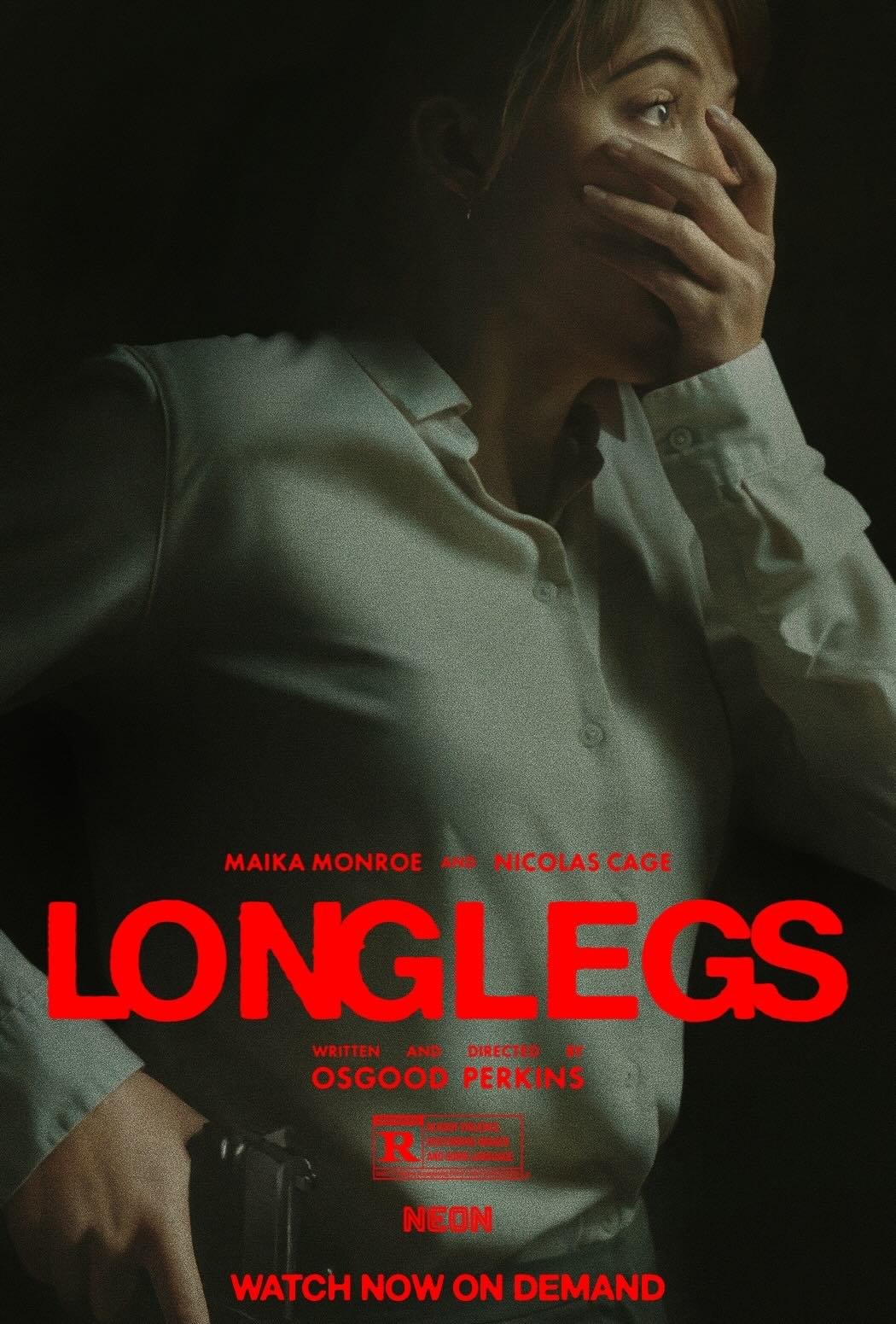 Official poster for Longlegs (2024), showing Maika Monroe with her hand over her mouth in fear