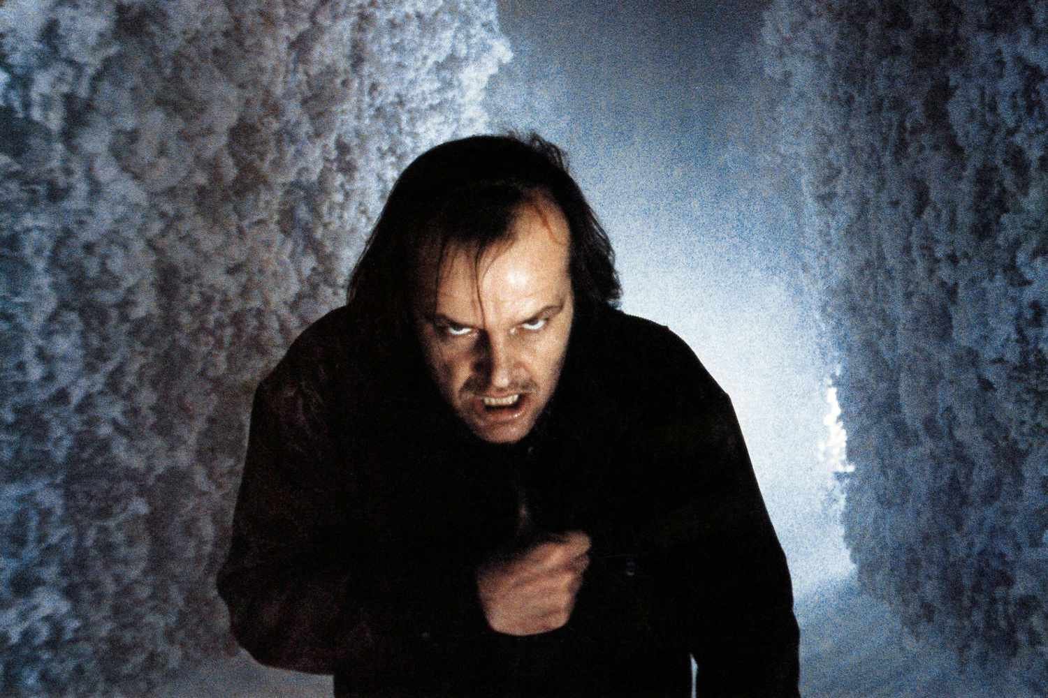 A feral Jack Torrance in the snow-covered hedge maze in The Shining
