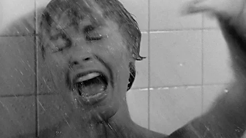 The iconic shower scene from Psycho (1960), Marion Crane screaming under the running water
