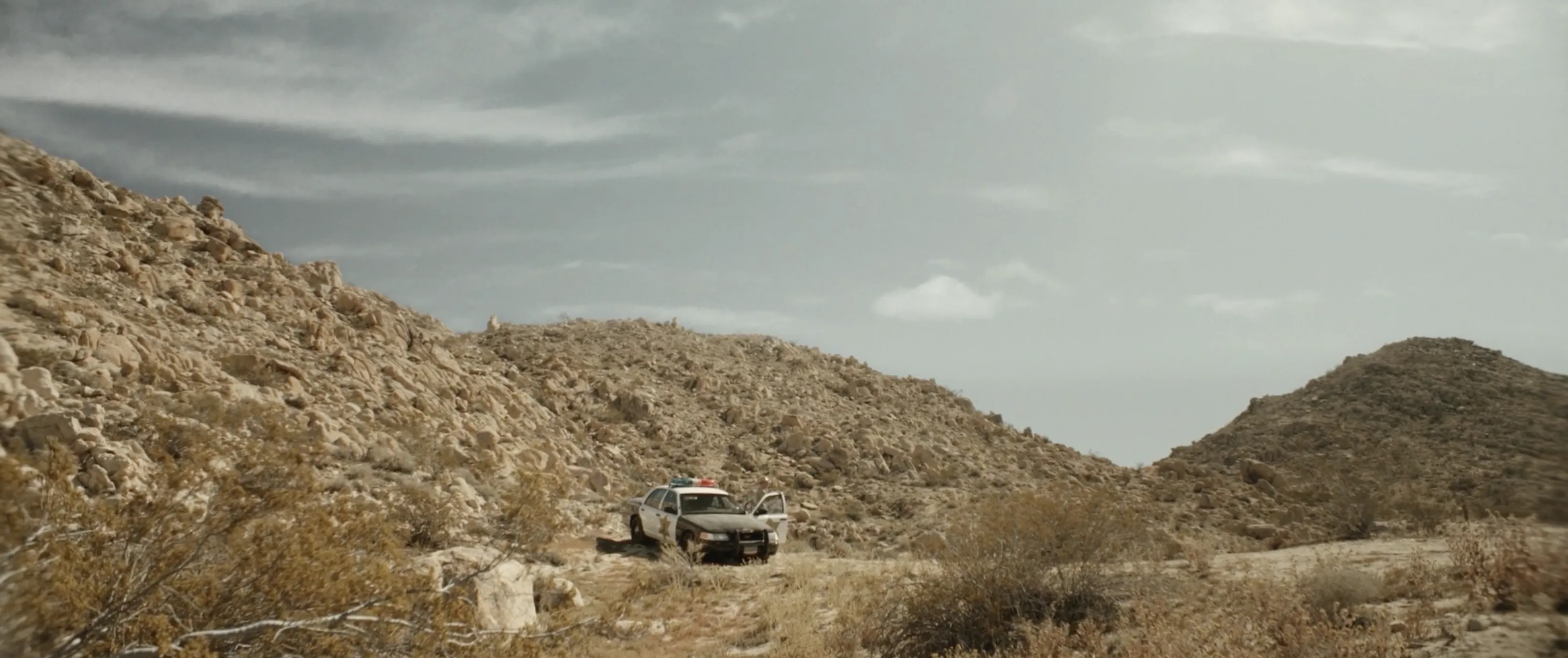 Sheriff Bilstein's patrol car alone in the New Mexico desert