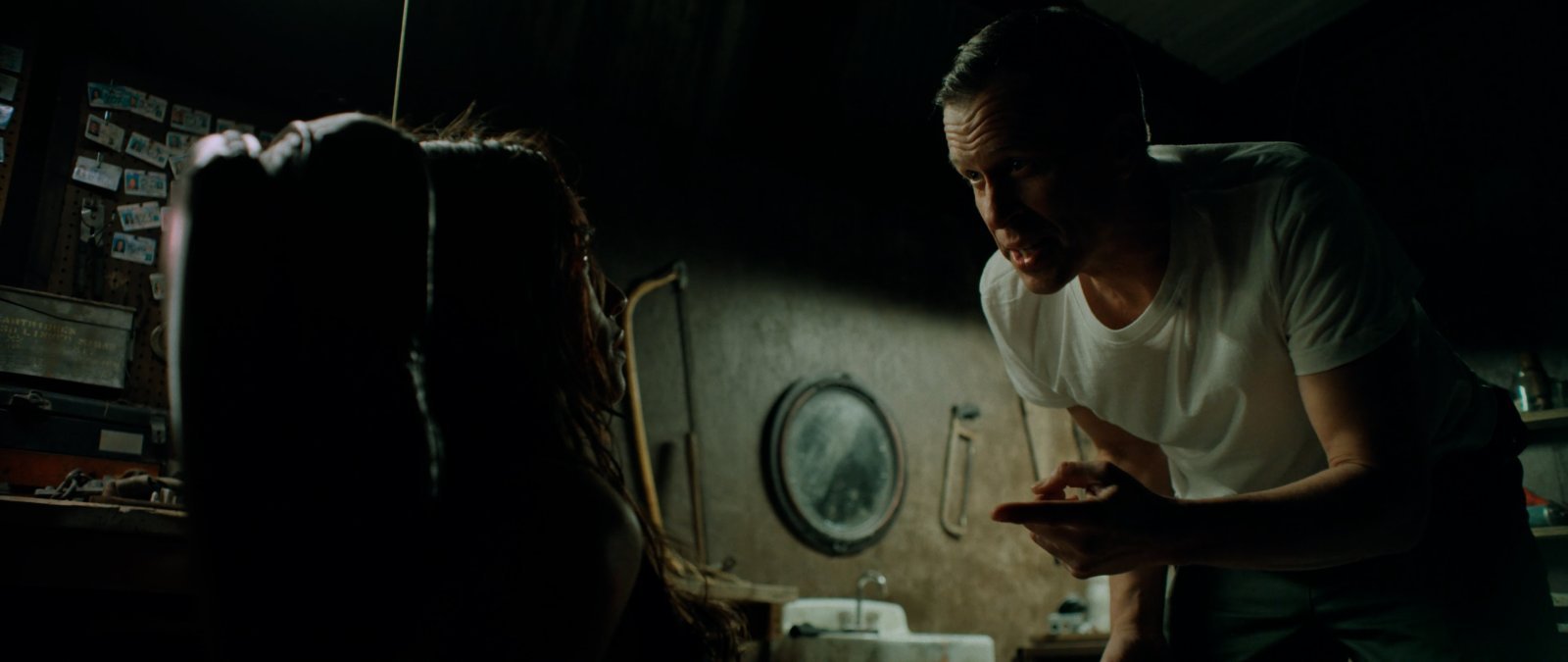 A close-up cinematography frame of Sheriff Bilstein in Blood Star