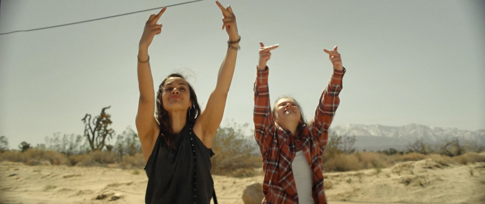 Sydney Brumfield as Amy with Britni Camacho as Bobbie in the desert in Blood Star